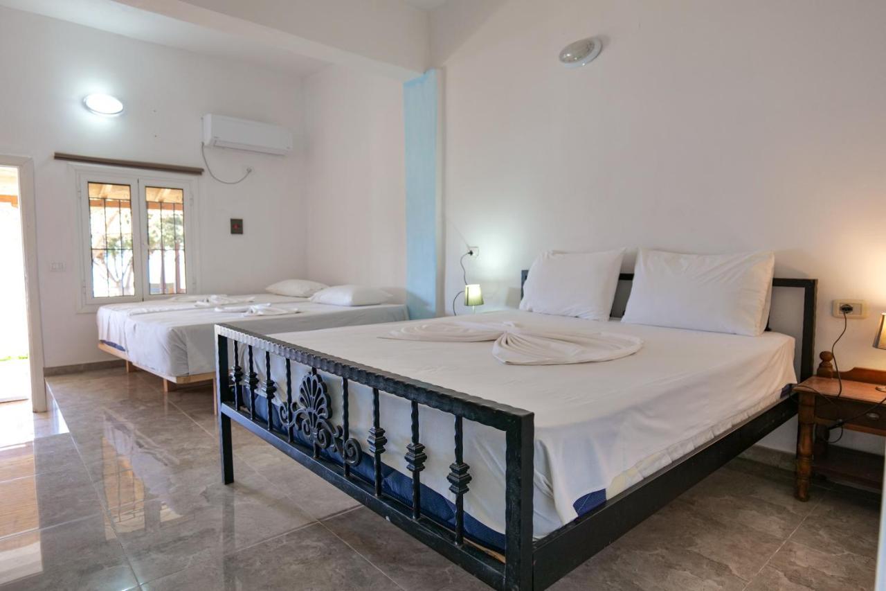 John'S Guesthouse Ksamil Extérieur photo