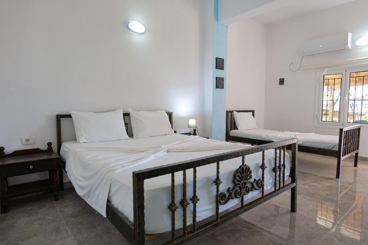 John'S Guesthouse Ksamil Extérieur photo